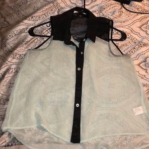 A light blue with black blouse!